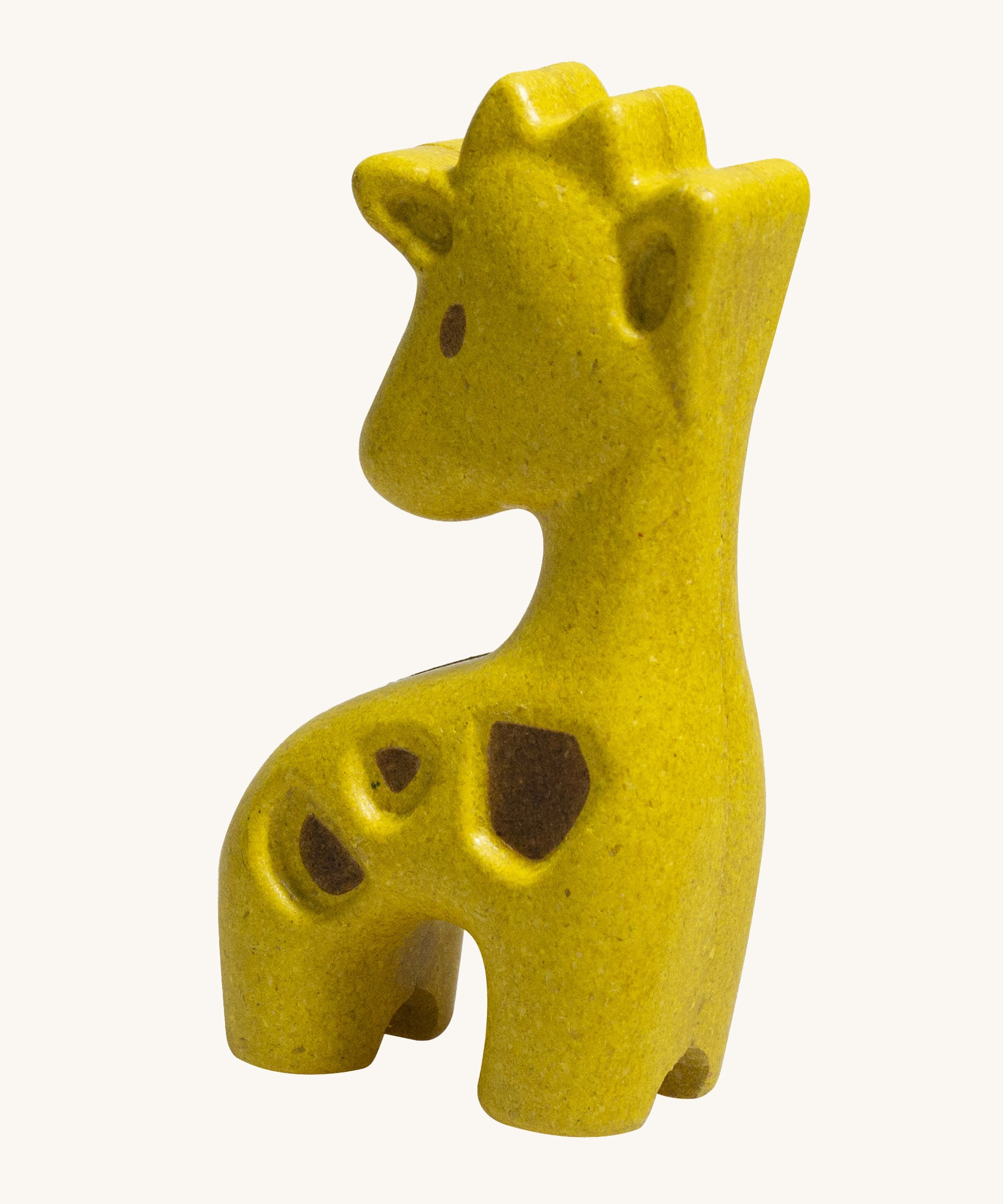 The PlanToys Giraffe is an adorable wild animal toy for little ones. Made from PlanWood, this giraffe is yellow with textured brown patches, and is on a cream background