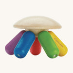 PlanToys plastic-free wooden flexi jellyfish shaped baby sensory and rattle toy in rainbow colours of, green, yellow, red, purple and blue, on a cream background