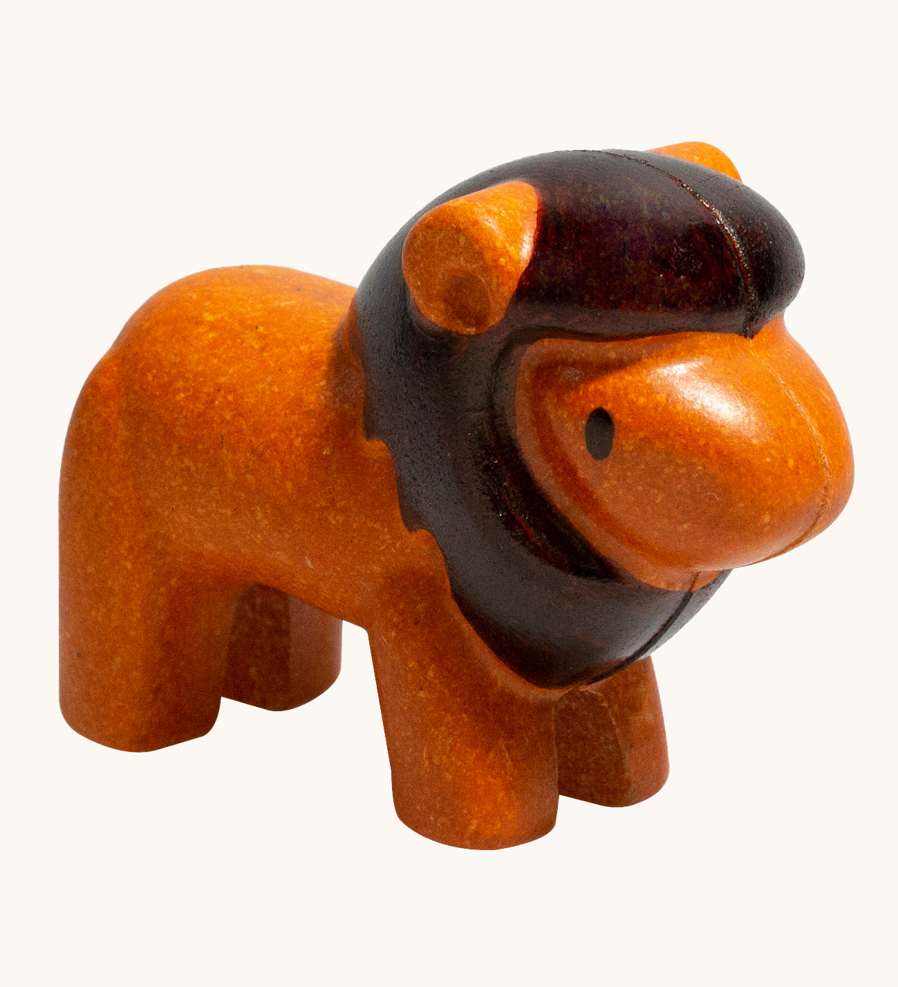 The PlanToys Lion is an adorable wild animal toy for little ones. Made from PlanWood, this lion is orange with a dark brown mane and eyes, and is on a cream background