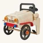 The PlanToys Motor Mechanic, educational toy features lots of removable parts and a wooden engine under the bonnet. The image is on a cream background