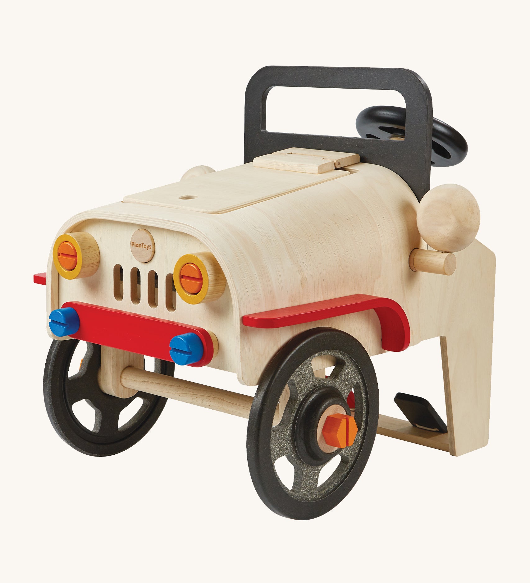 The PlanToys Motor Mechanic, educational toy features lots of removable parts and a wooden engine under the bonnet. The image is on a cream background