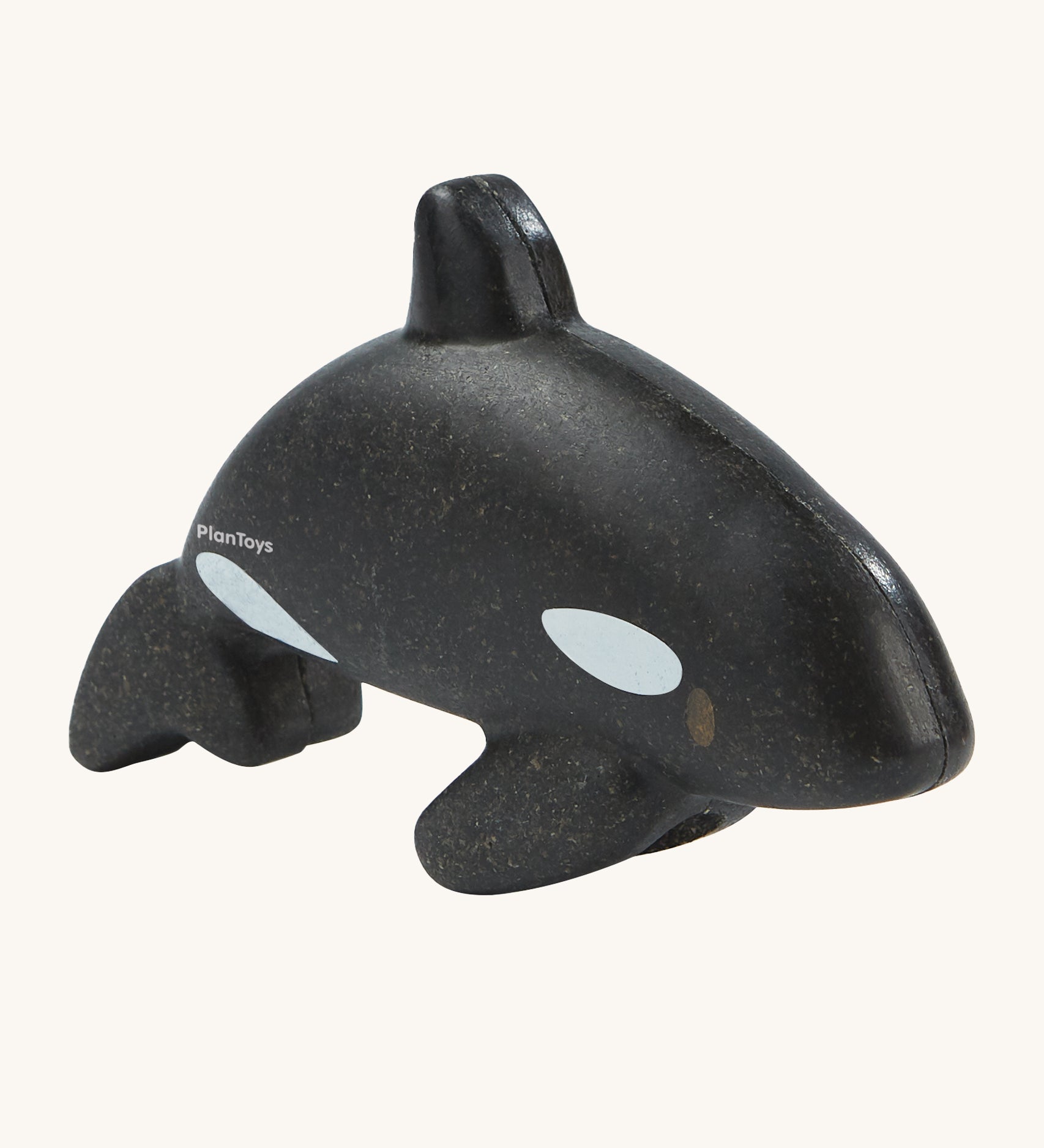 The PlanToys Orca is an adorable sea life toy for little ones. Made from PlanWood, this orca is black with white spots, and is on a cream background