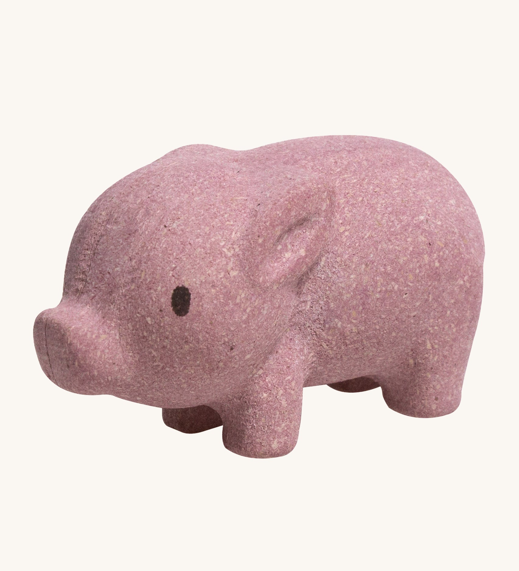 The PlanToys Pig is an adorable farm yard toy for little ones. Made from PlanWood, this pig is pink with black eyes, and is on a cream background