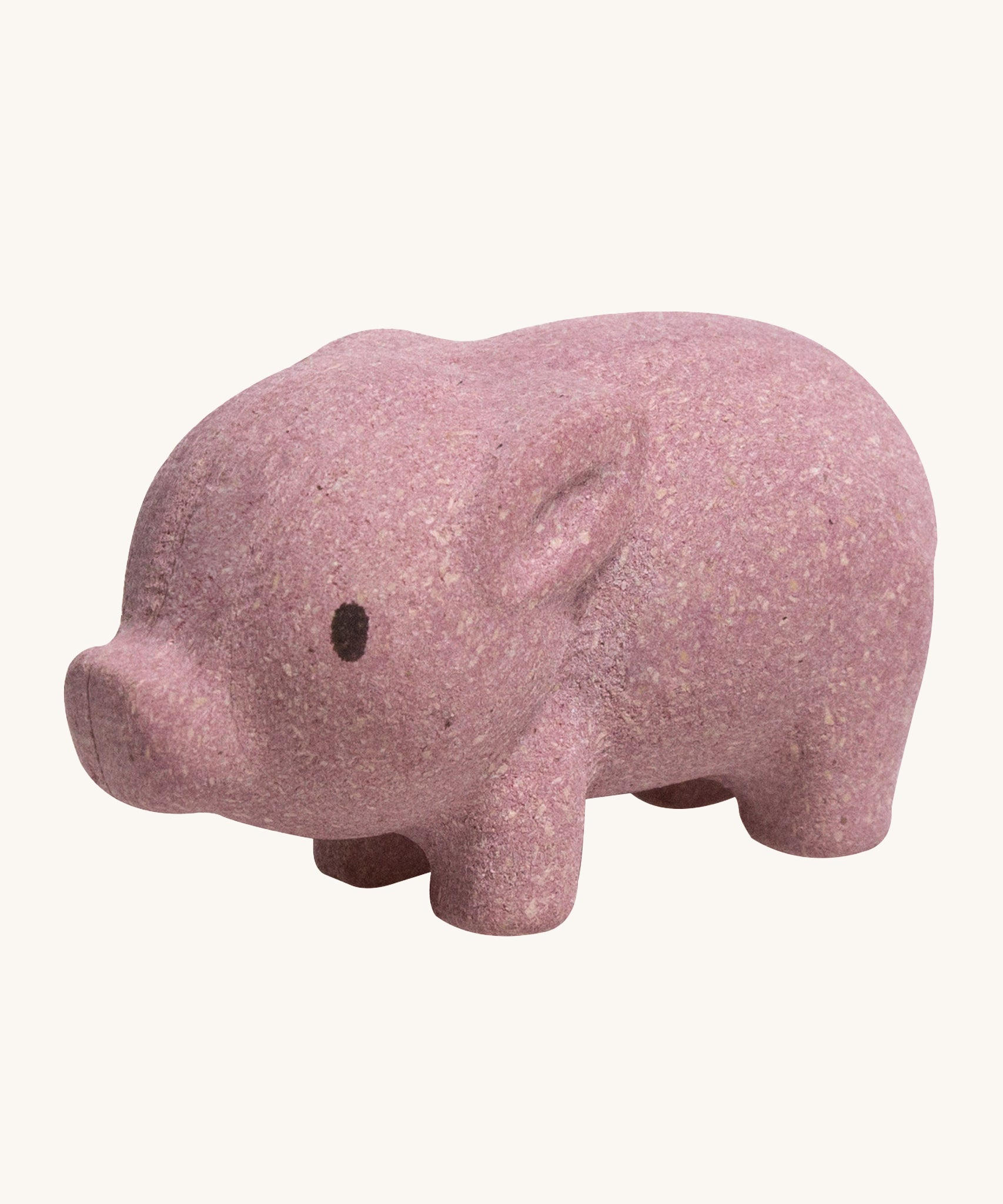 The PlanToys Pig is an adorable farm yard toy for little ones. Made from PlanWood, this pig is pink with black eyes, and is on a cream background