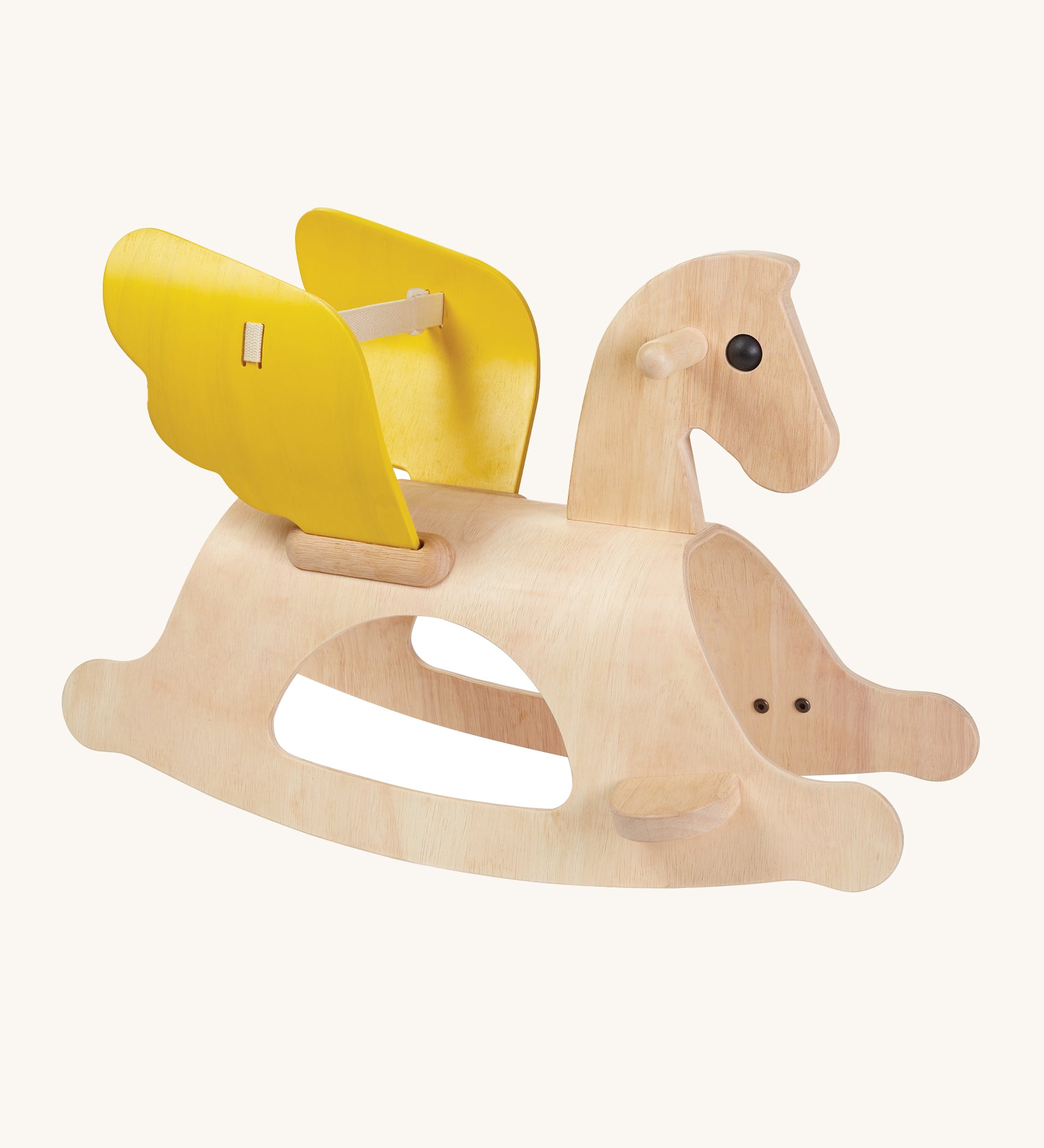 The PlanToys Rocking Pegasus, is a beautiful first rocking horse made from wood with the natural wood grain showing through, yellow wings and a back support between both wings. The image is on a cream background