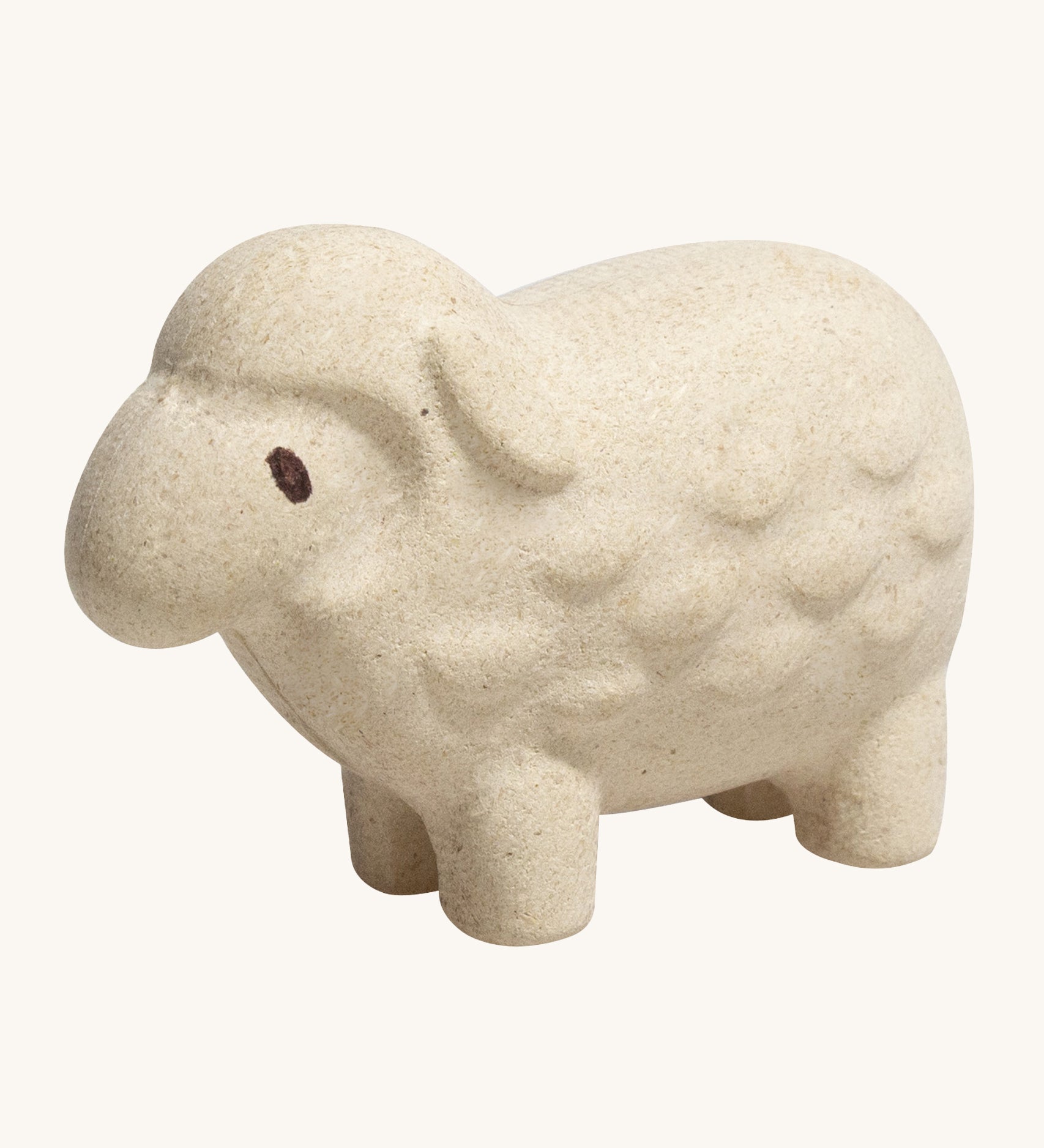 The PlanToys Sheep is an adorable farm yard toy for little ones. Made from PlanWood, this sheep is white with black eyes, a bumpy texture to mimic wool, and is on a cream background