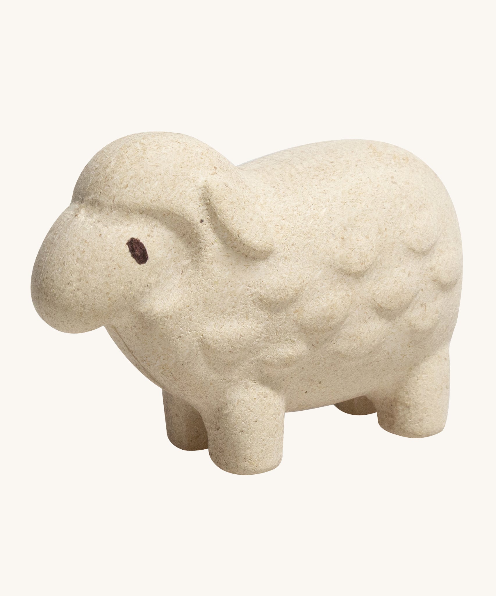 The PlanToys Sheep is an adorable farm yard toy for little ones. Made from PlanWood, this sheep is white with black eyes, a bumpy texture to mimic wool, and is on a cream background