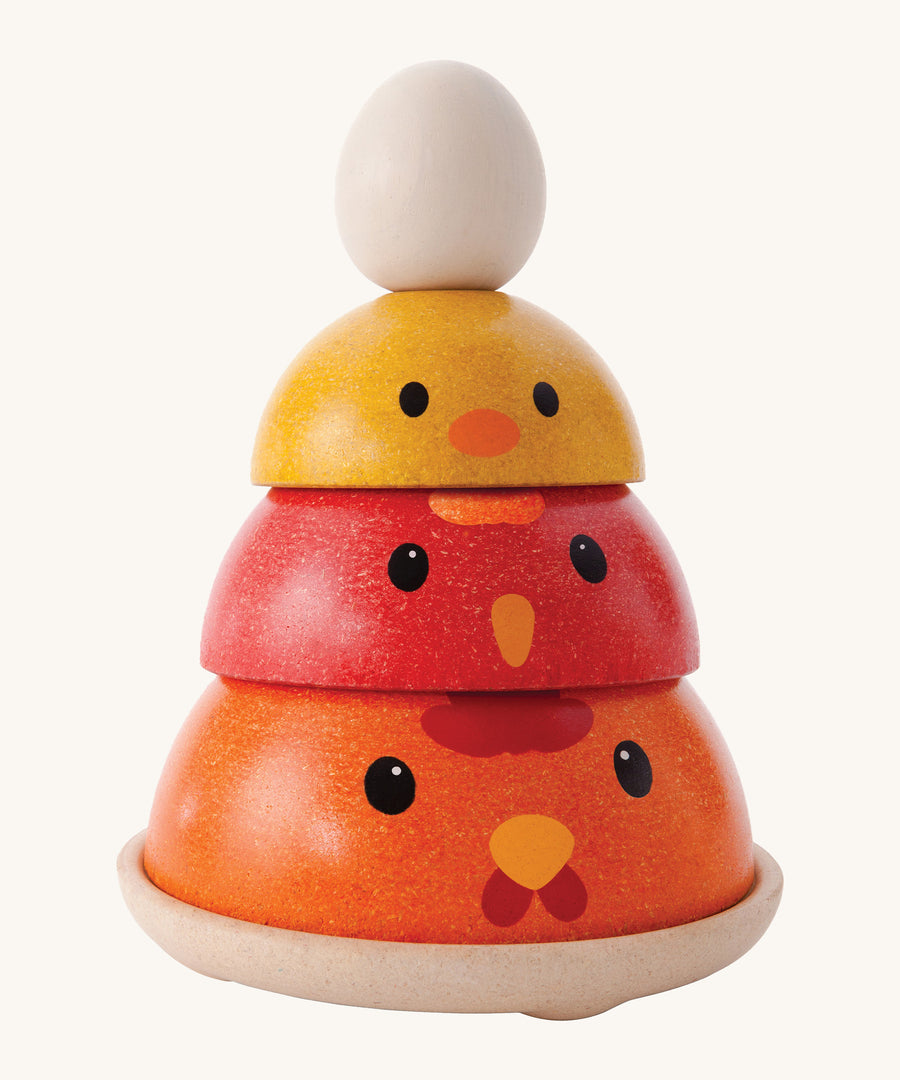 The PlanToys Chicken Nesting toy is a fun, cute and colourful stacking toy for little ones. The set comes with 3 stacking bowls with an adorable chicken face on the front, and an egg to be balanced on top. The chicken bowls are orange, red and yellow.