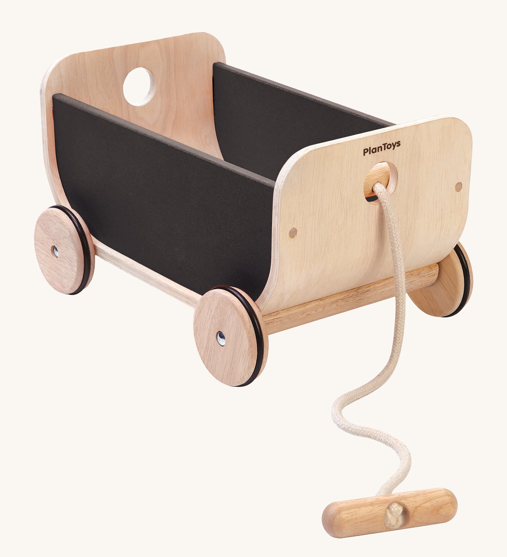 PlanToys Wooden Black Cart Toy, is a lovely push and pull toy with a curved front and back, and black sides. The wagon also come with a removable beige rope and handle, on a cream background