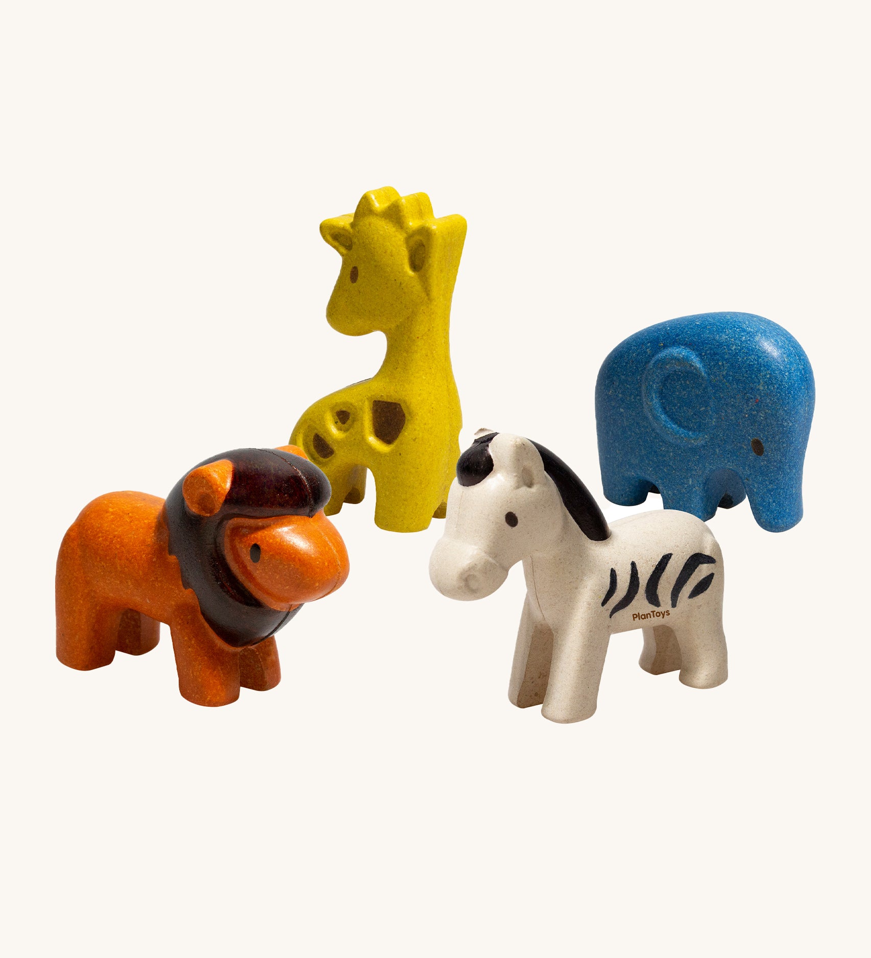 The PlanToys Wild Animals Set comes with four, adorable animal figures which include an orange lion, a yellow giraffe, a blue elephant and a white zebra with black stripes. The image is on a cream background