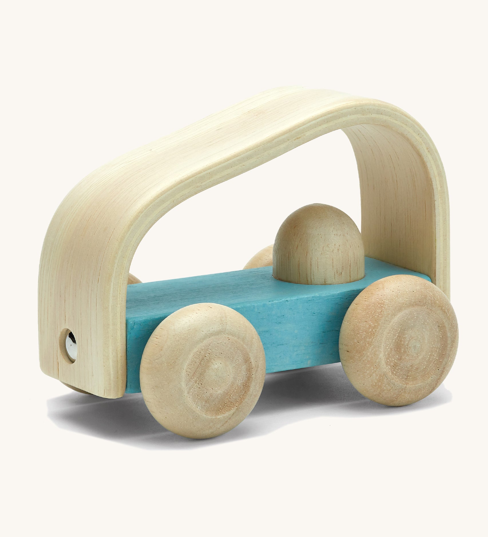 Plan toys eco-friendly wooden vroom car vehicle toy on a cream background