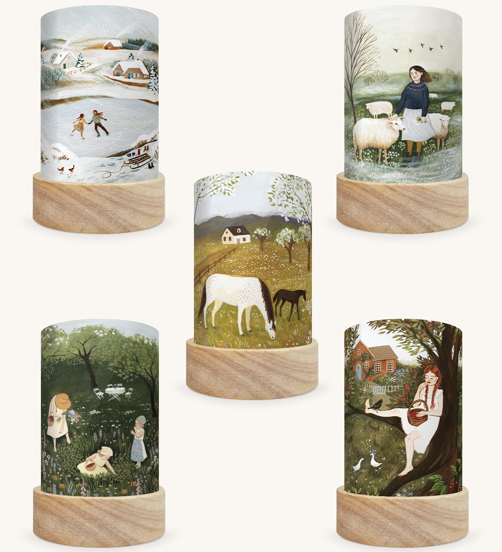 A set of 5 Illustration by Robin Pieterse, featuring 5 different Magic Lantern Silhouettes which are: Spring Frolic, Cherry Season, Picking Strawberries, The Herdress and Rosy Cheeks. The image is on a cream background.