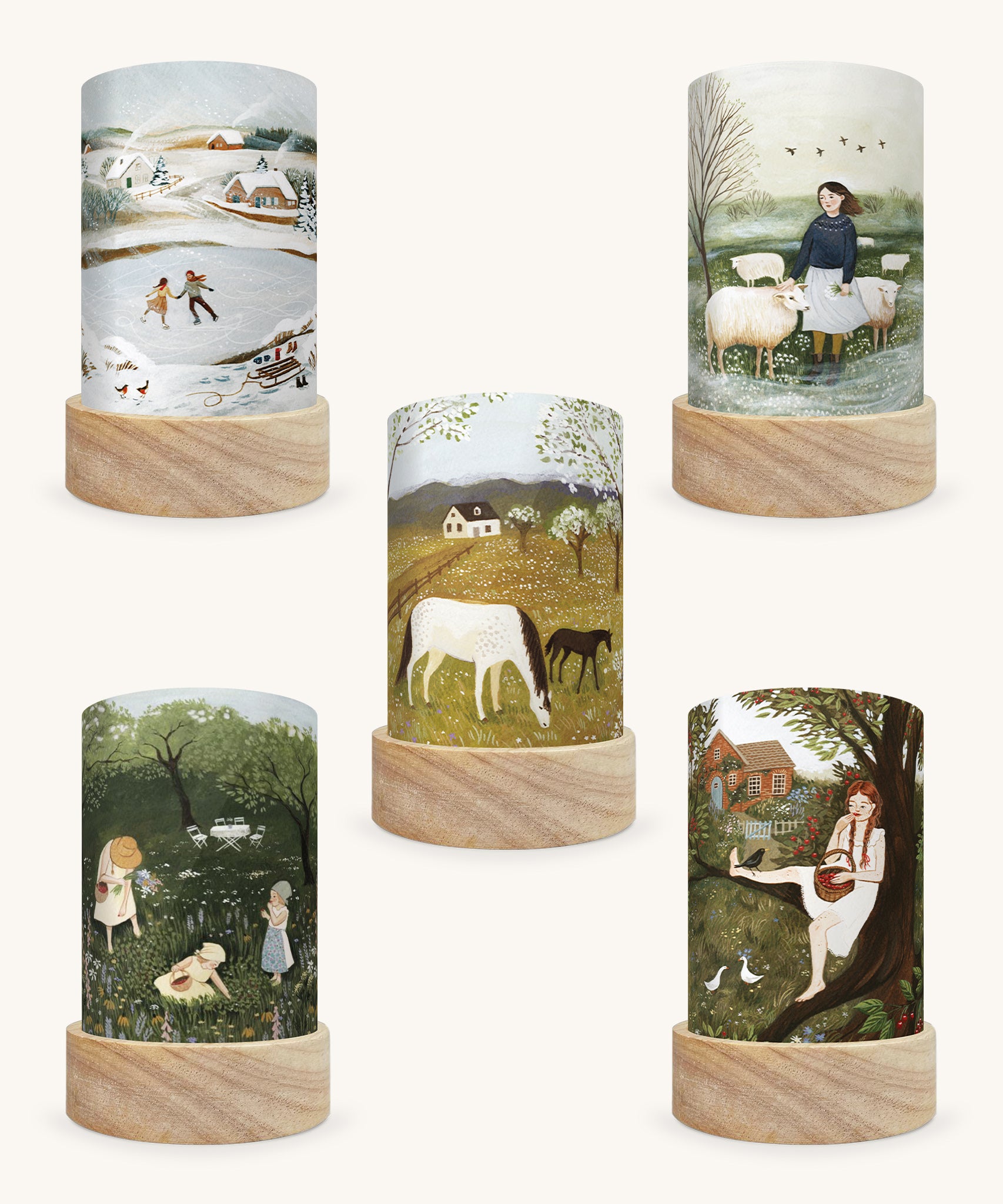 A set of 5 Illustration by Robin Pieterse, featuring 5 different Magic Lantern Silhouettes which are: Spring Frolic, Cherry Season, Picking Strawberries, The Herdress and Rosy Cheeks. The image is on a cream background.