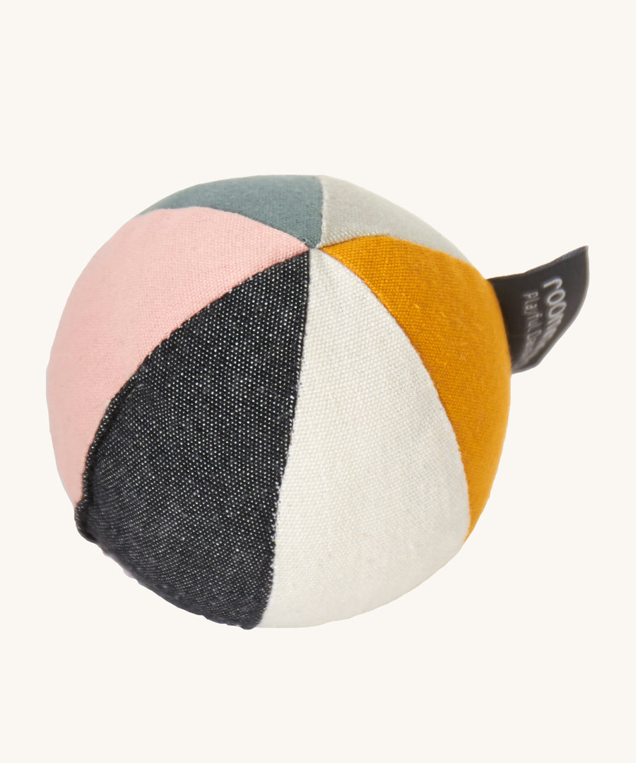 Roommate Canvas Ball With Bell - Pink, with different coloured sections on the ball, on a cream background