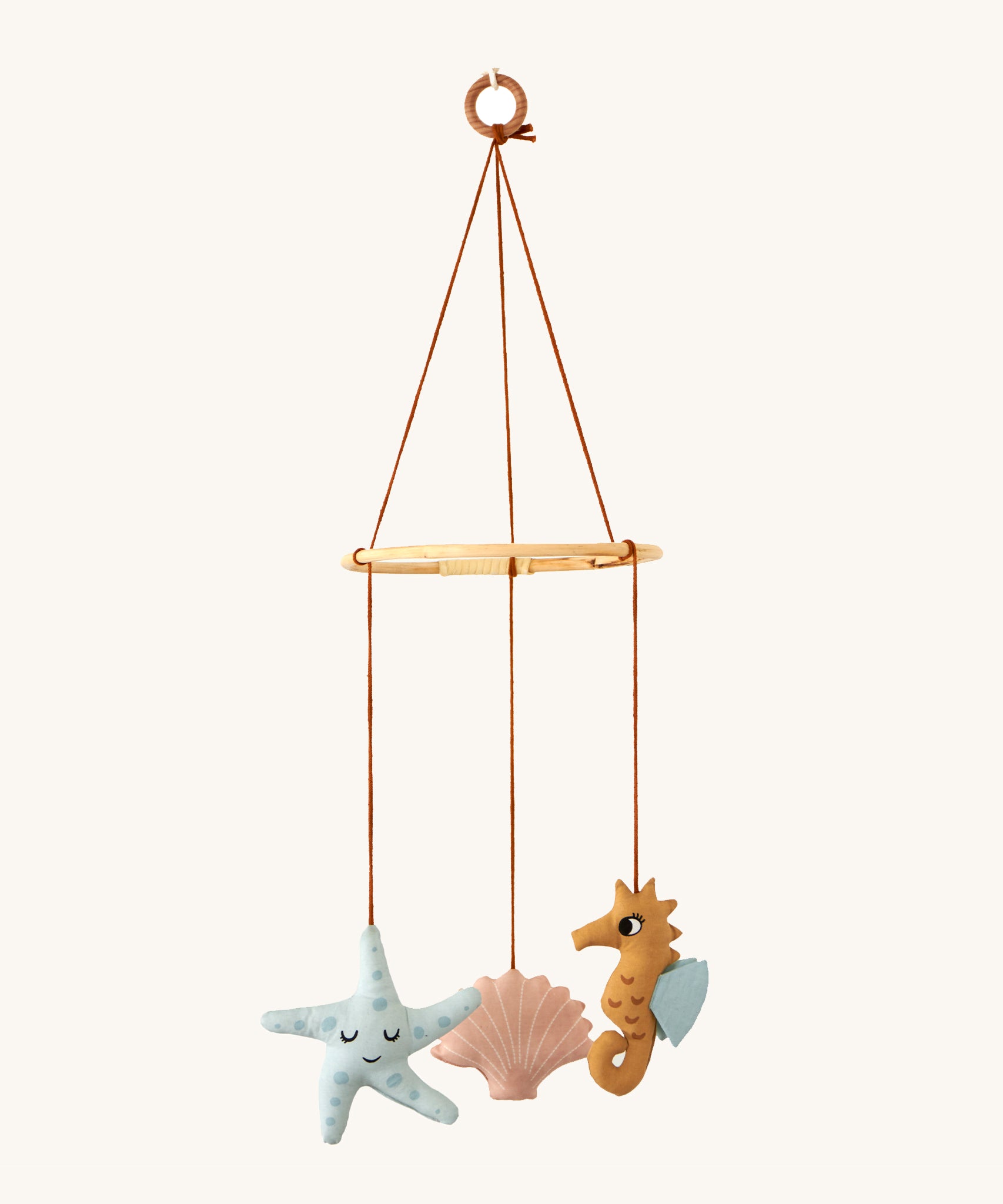 Roommate Sealife Hanging Mobile. A lovely nautical themed hanging mobile with a sleepy blue starfish, pink shell, and mustard yellow seahorse