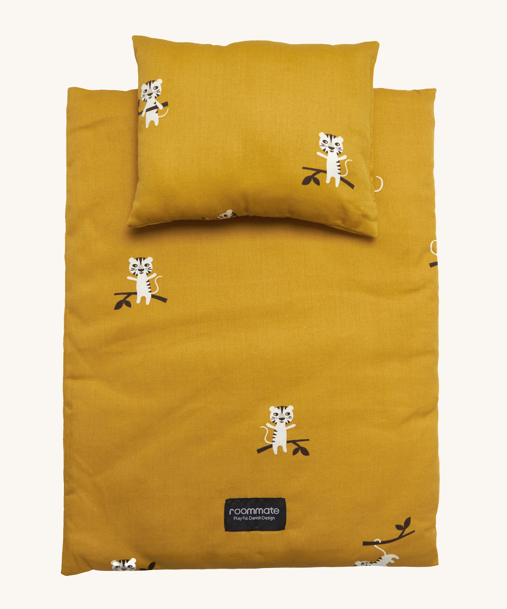 Roommate Doll Bedding Set - Tiger, in a mustard yellow colour, with adorable tiger print. The image shows a blanket and a pillow set on a cream background