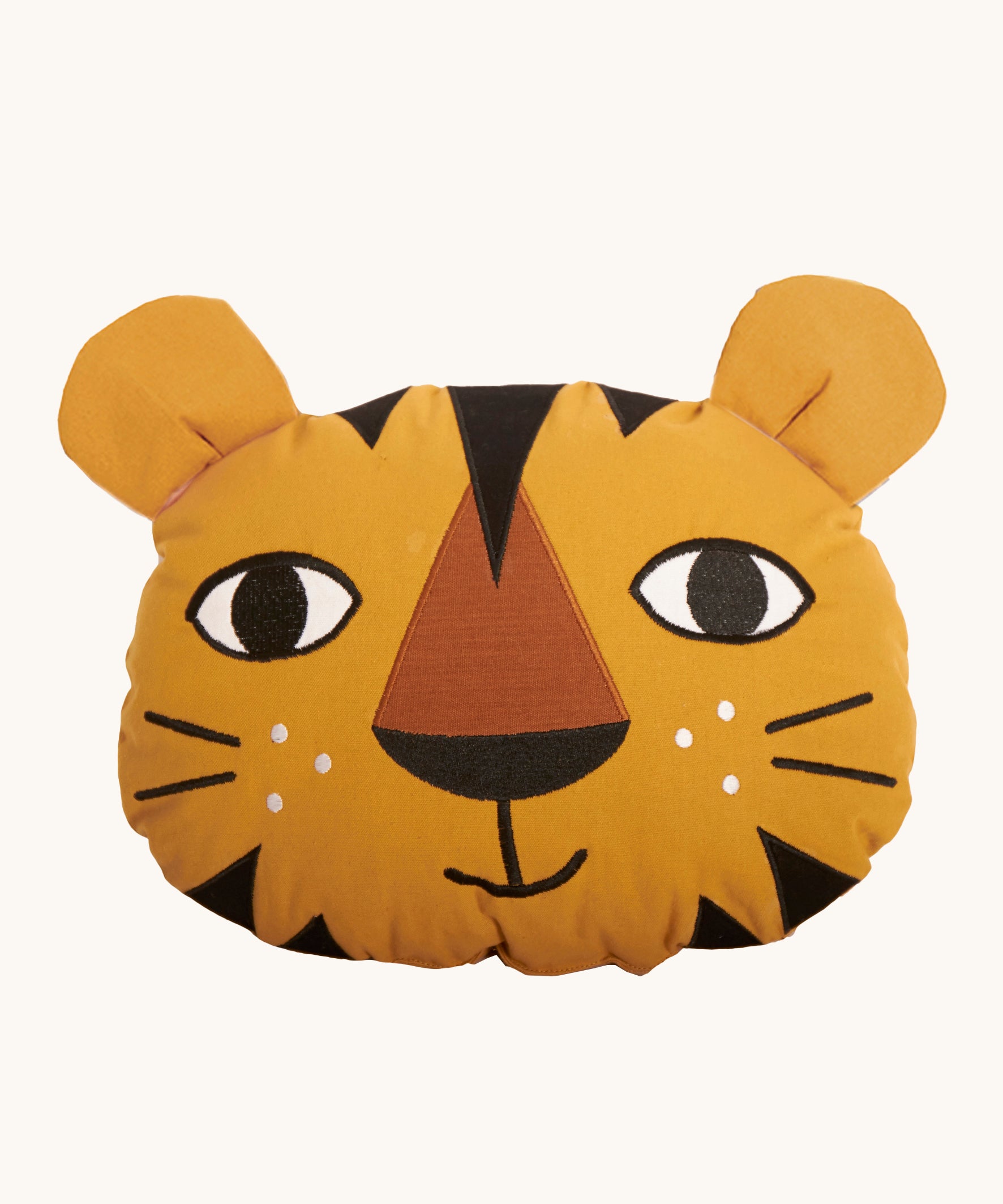 Roommate Tiger Cushion made from organic cotton on a cream background. The tiger cushion has embroidered features and is yellow with black stripes on its head and chin area