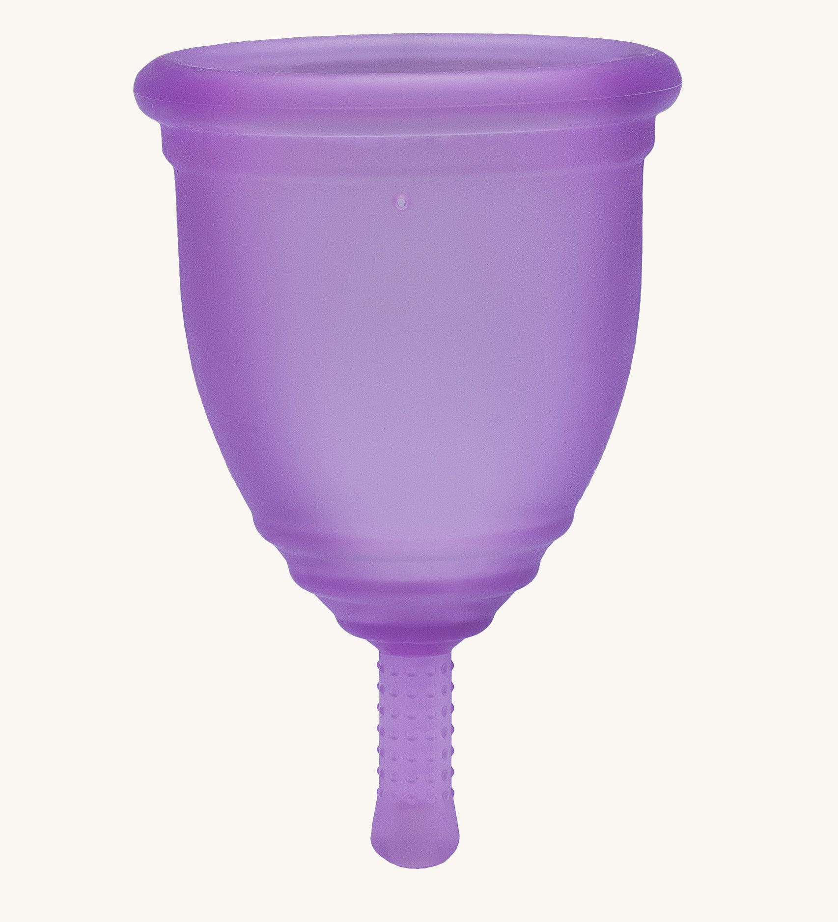 Ruby Cup Menstrual Cup in purple silicone, on a cream background