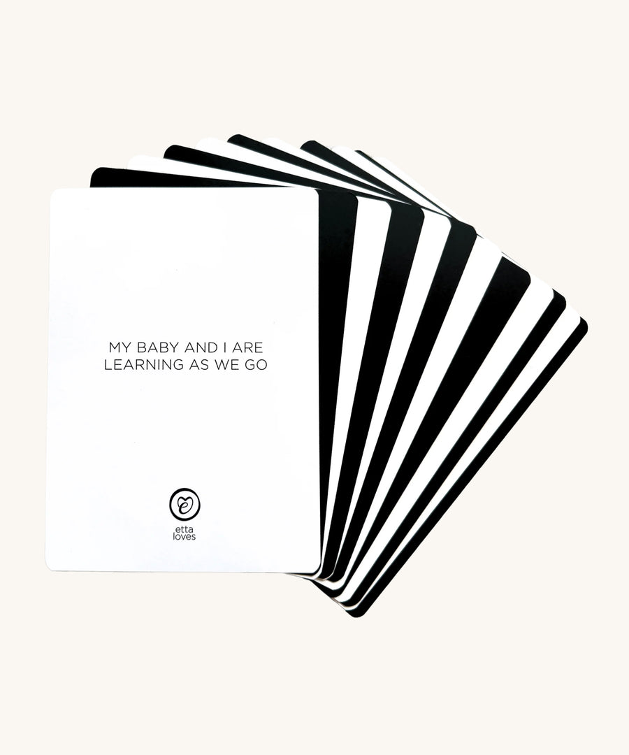 The Etta Loves Sensory Positive Affirmation Flash Cards, showing the Positive Affirmations side. The first card reads "My baby and I are learning as we go" on a cream background