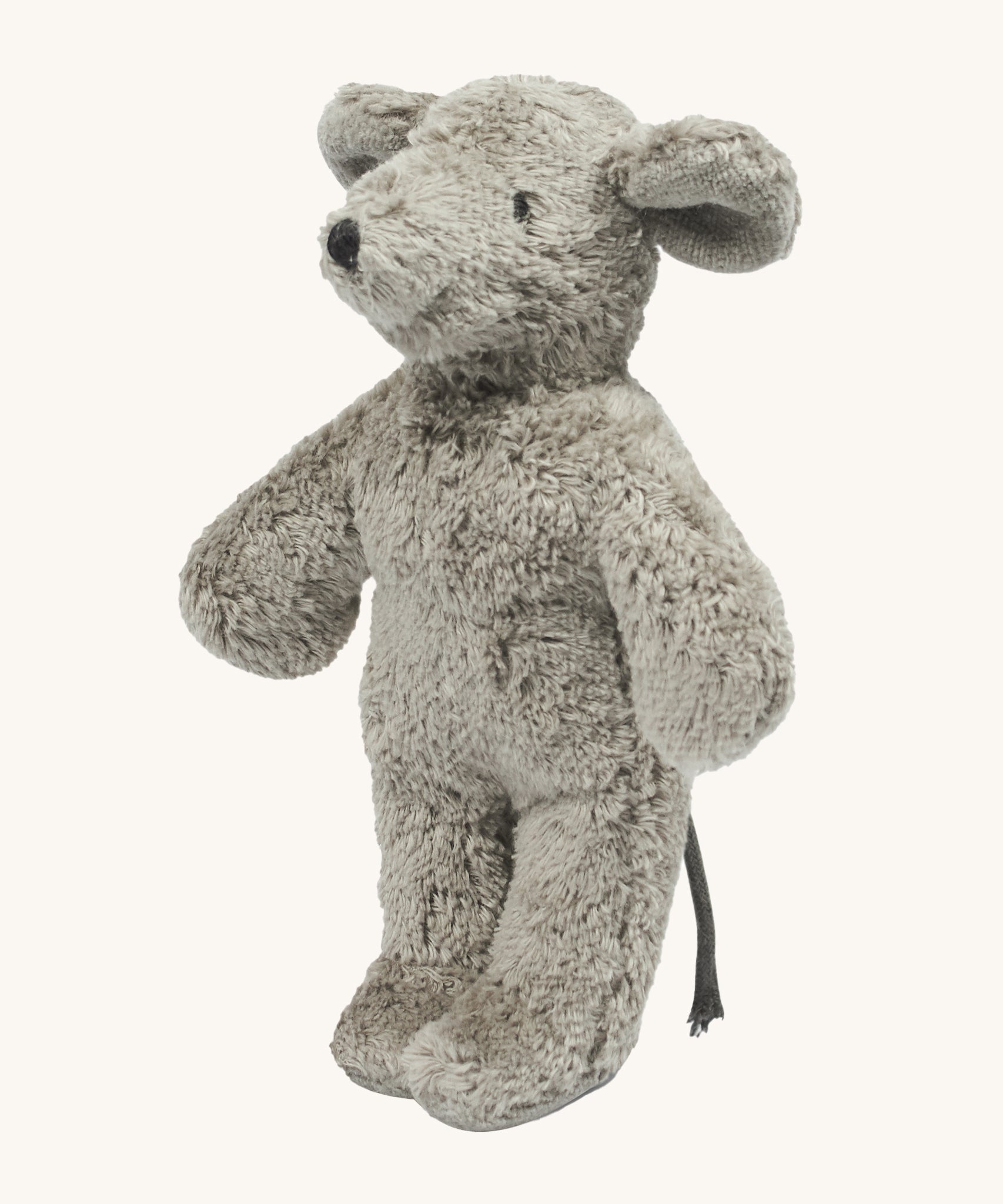 Senger Baby Mouse is a soft cuddly childs toy in light grey with a darker grey tail. The image is on a cream background