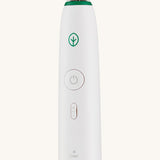 A close up of the sonic toothbrush switch 