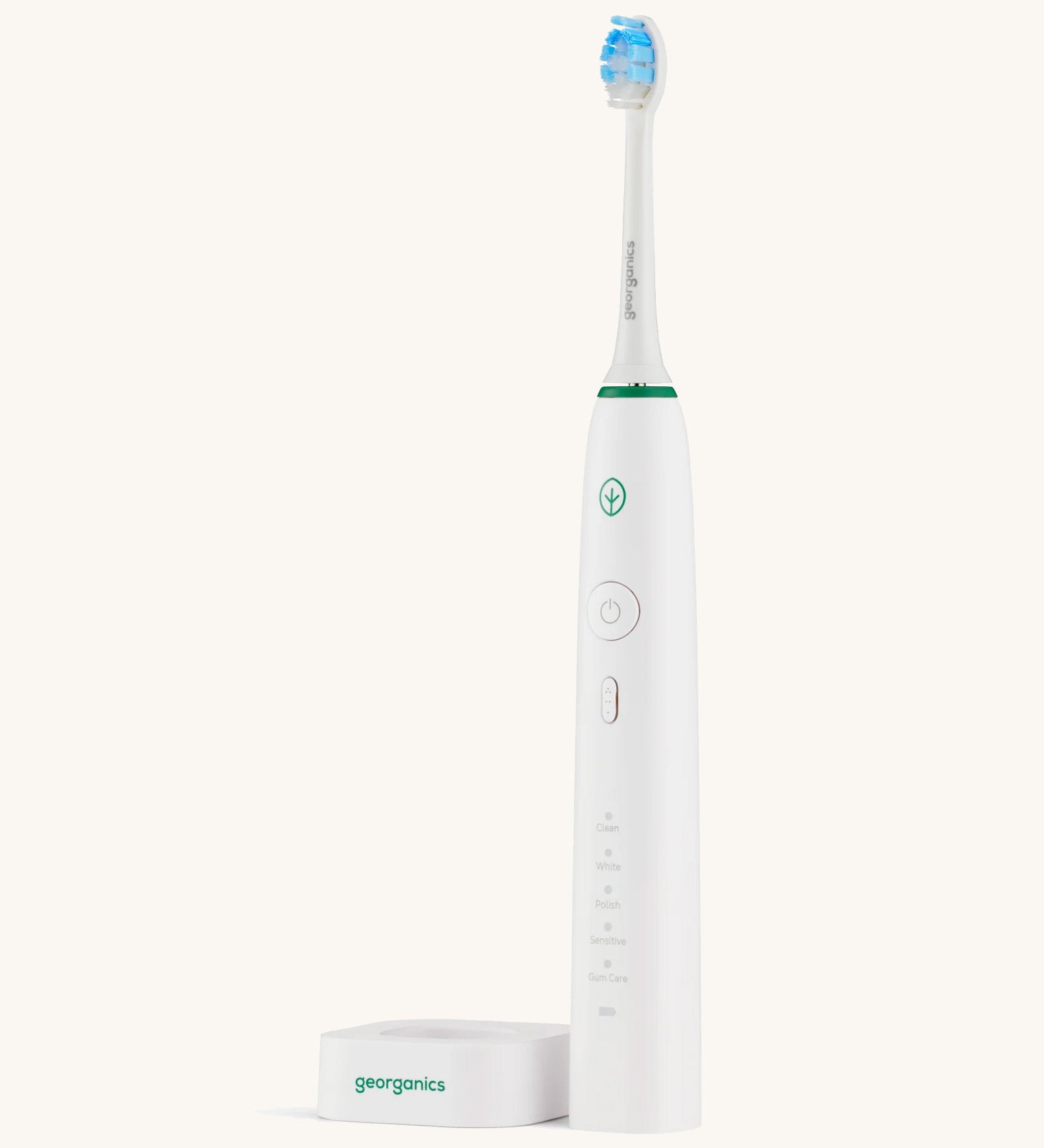 The Georganics toothbrush off the charging stand 