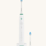 A Georganics sonic toothbrush set with the 50000spm replacement head on a cream background