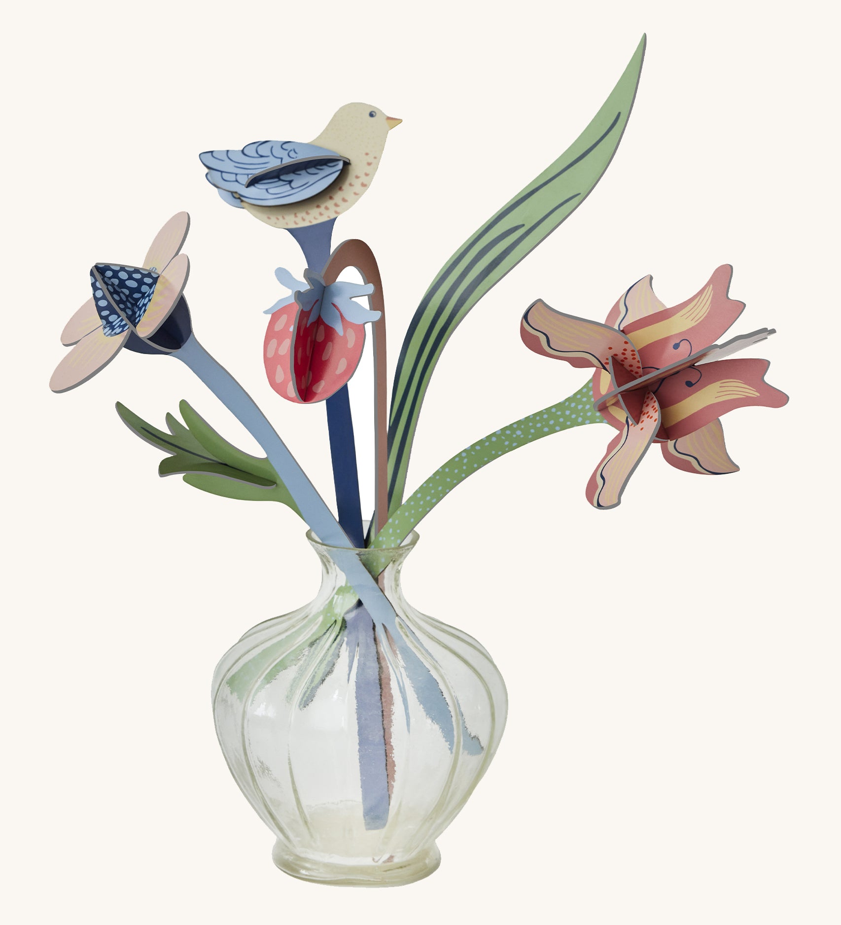 Studio Roof Cardboard Bouquet - William Morris on a cream background. The image shows a round glass vase with the William Morris Bouquet inside