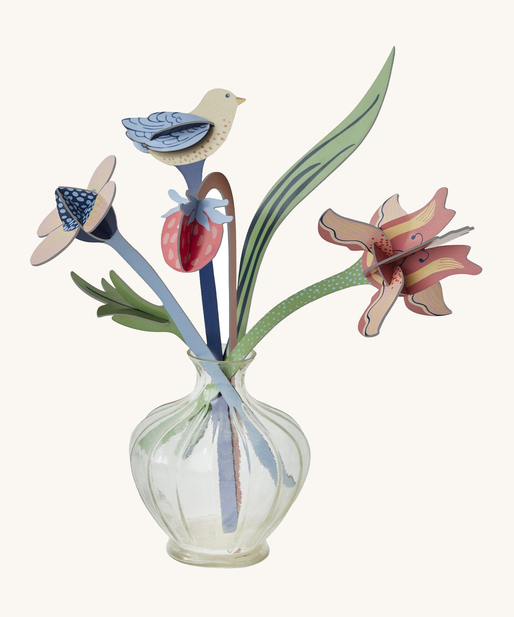 Studio Roof Cardboard Bouquet - William Morris on a cream background. The image shows a round glass vase with the William Morris Bouquet inside