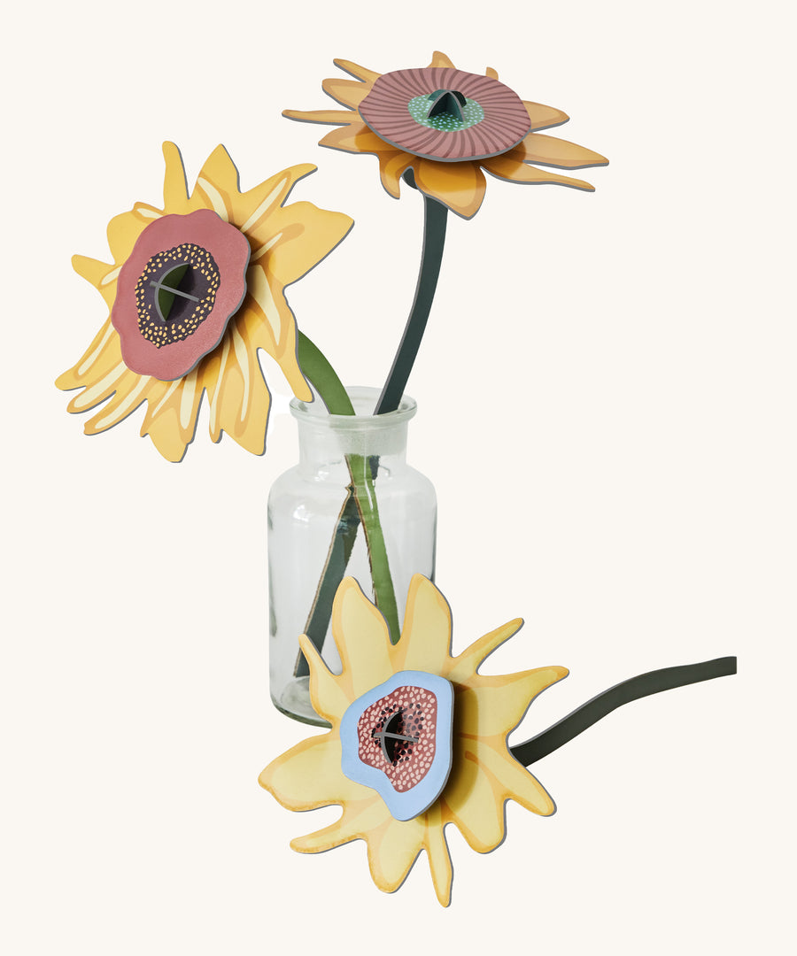 Studio Roof Cardboard Bouquet - Van Gogh Sunflowers, stood in a glass vase on a cream background