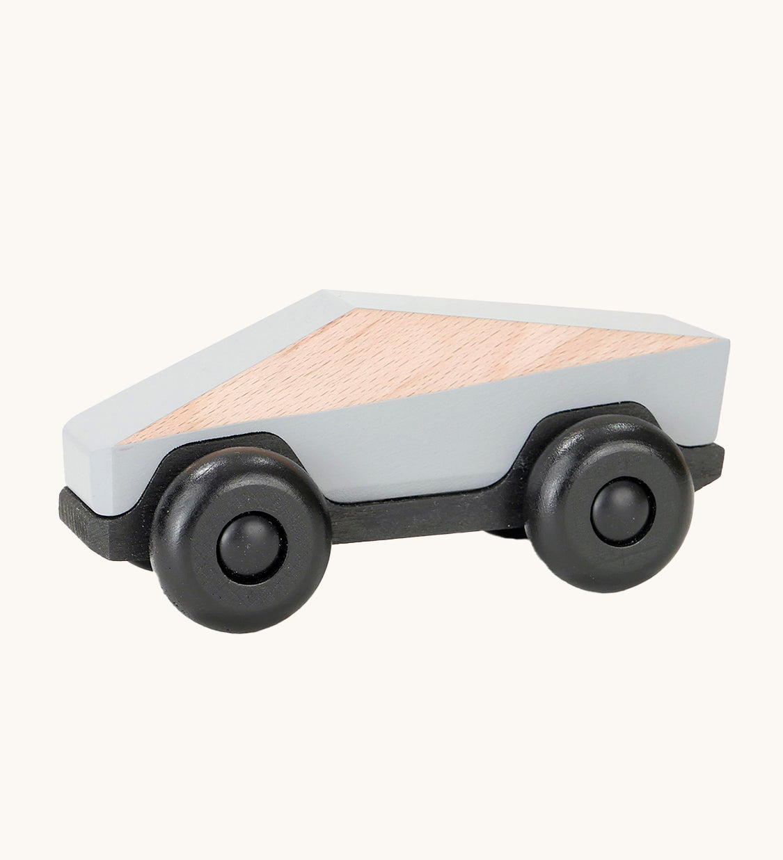 Tobe Poly Car in light grey and black, on a cream background. The car is made from wood in a geometric shape to give a futuristic feel.