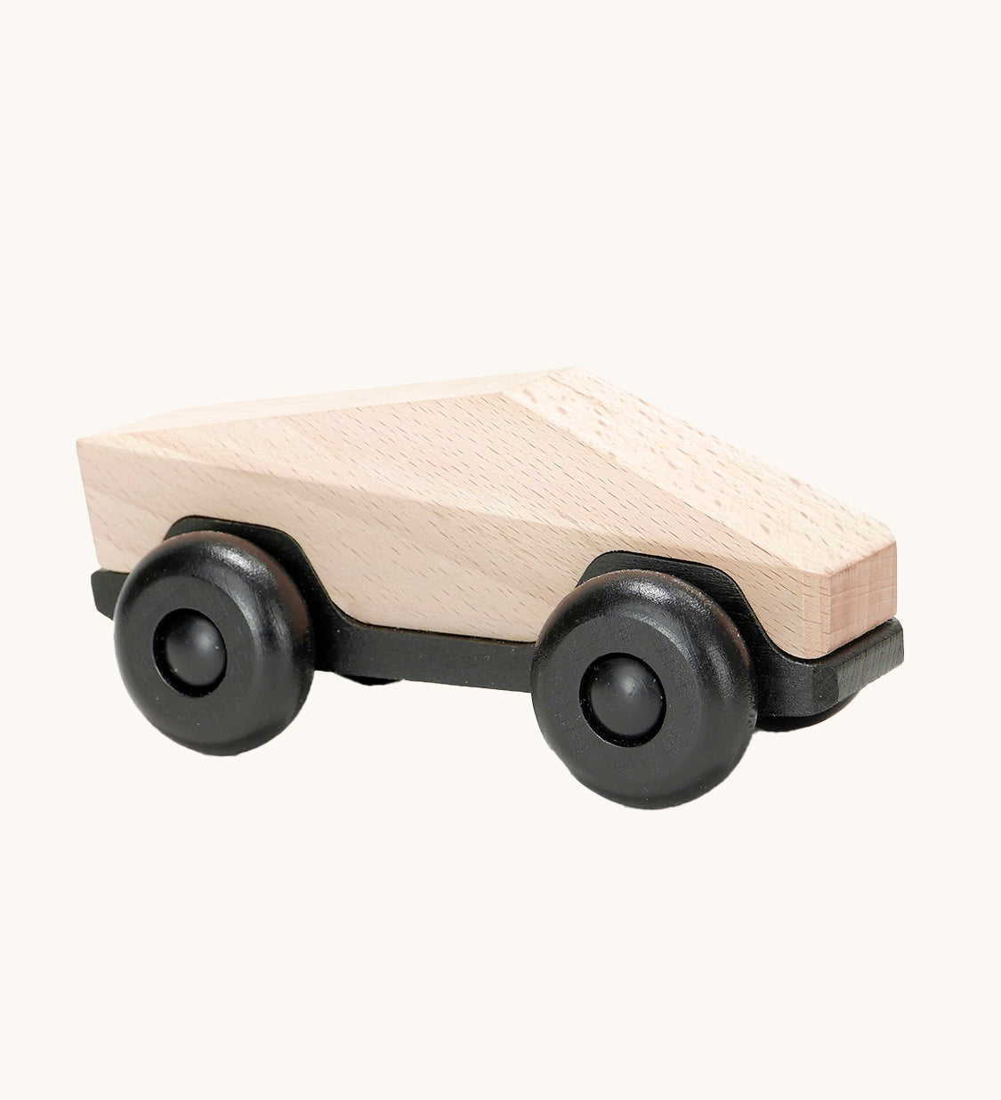 Tobe Poly Car in natural wood and black, on a cream background. The car is made from wood in a geometric shape to give a futuristic feel.