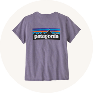 Patagonia purple t-shirt on cream background to represent women's tops and t-shirts at Babipur.