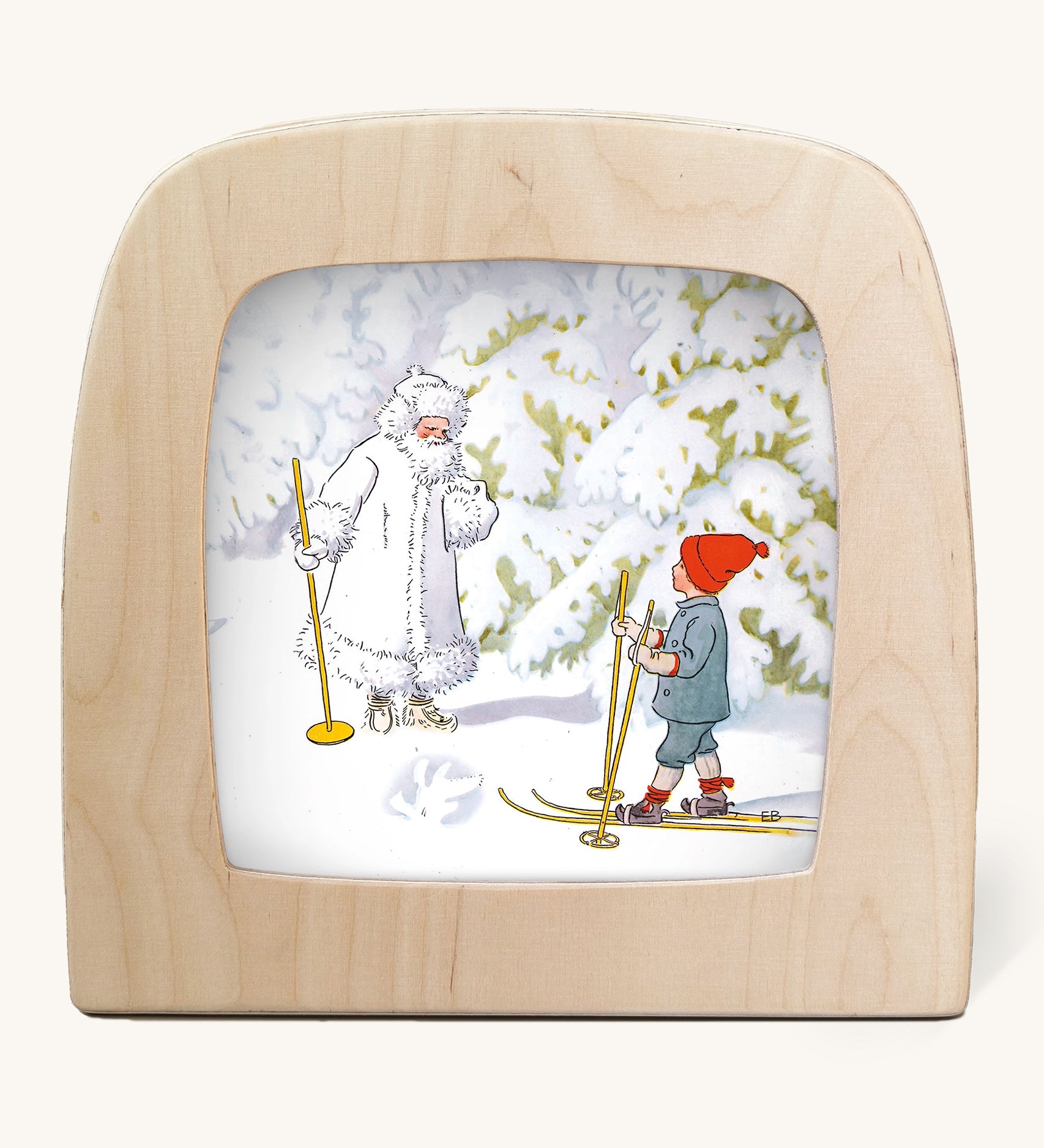 An illustration of a child skiing and meeting Jack Frost in a snowy wooded area from Ollie's Ski Trip Toverlux StoryLux Silhouette Sets, by Elsa Beskow. The illustration is inside a Magic Lamp on a cream background