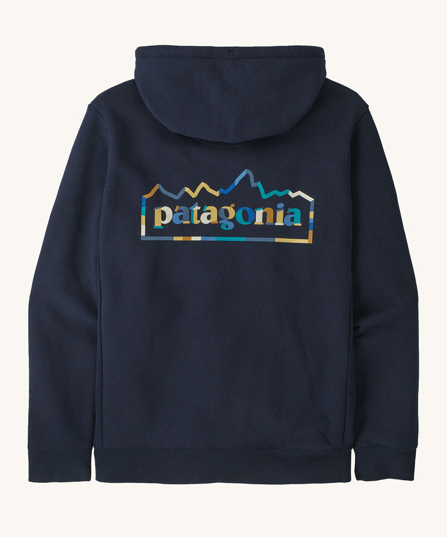 The back of the Patagonia Unity Fitz Uprisal Hoody - New Navy. The image shows the navy hoodie from the back with a colourful Patagonia Unity Fitz logo