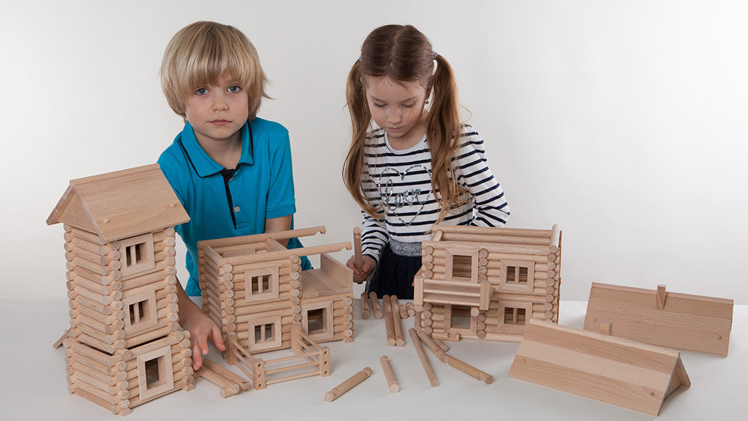 Kids building a Walachia wooden house