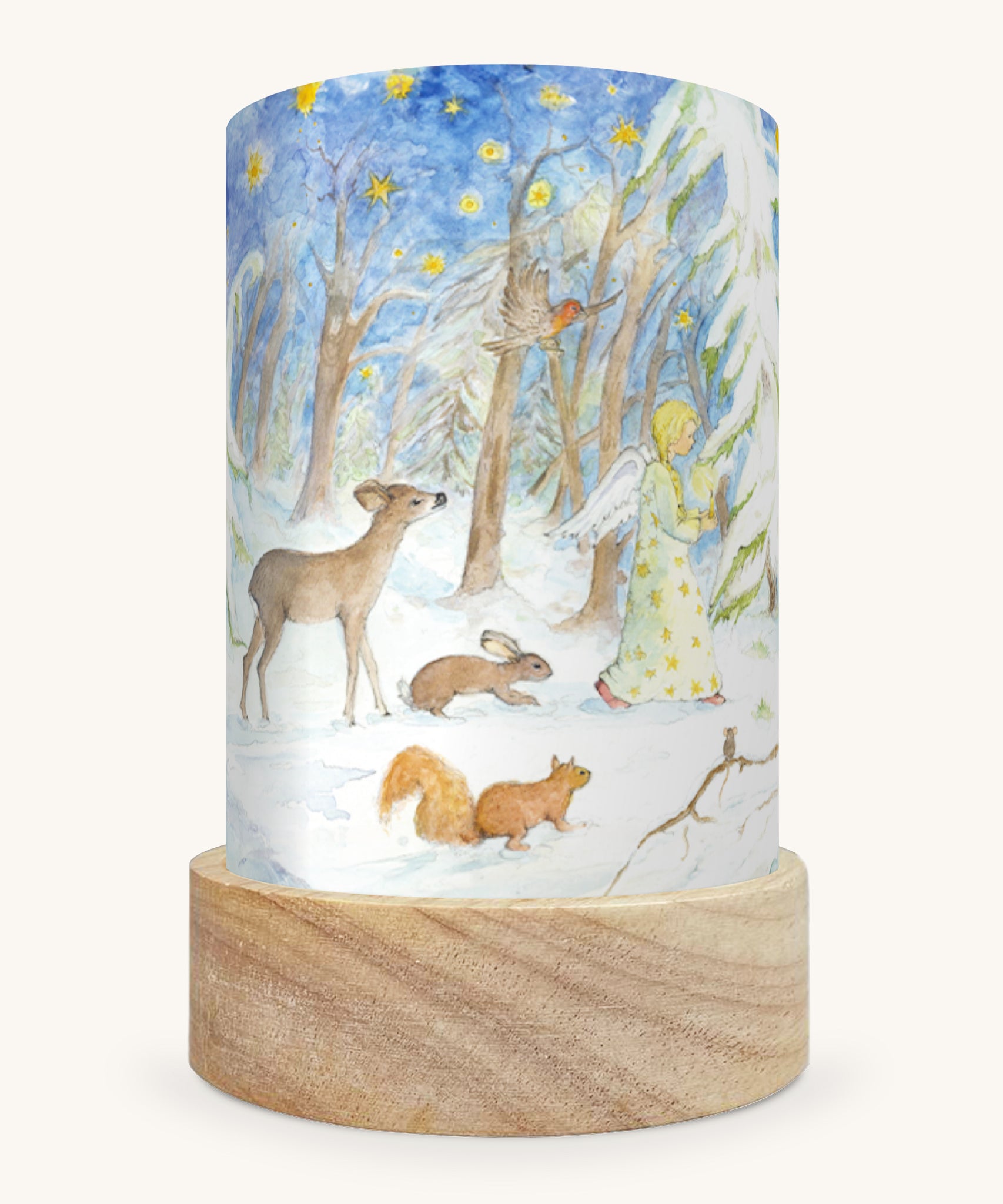 The Winter Forest illustration by Eentje Van Margo sat in a Toverlux Magic Lantern base, on a cream background