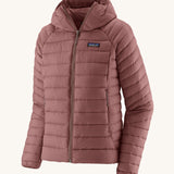 Patagonia Women's Down Sweater Hoody - Dulse Mauve. A light weight  coat in a light pink colour, on a cream background