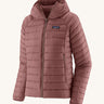 Patagonia Women's Down Sweater Hoody - Dulse Mauve. A light weight  coat in a light pink colour, on a cream background