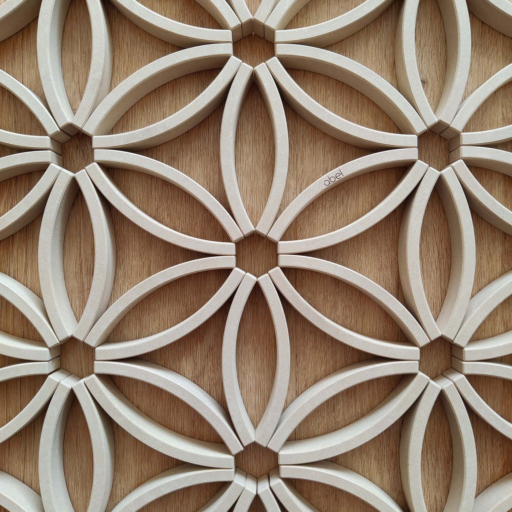 Picture of the Abel Blocks Mini Re-Wood positioned into a mandala pattern.