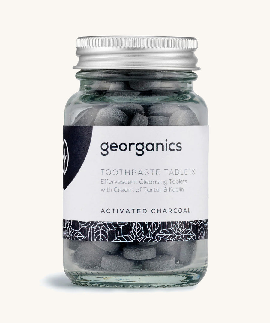 A jar of the Georganics activated charcoal toothpaste tablets