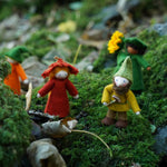 Close up of the Ambrosius rosehip girl stood next to the ambrosius dwarf father on some green moss