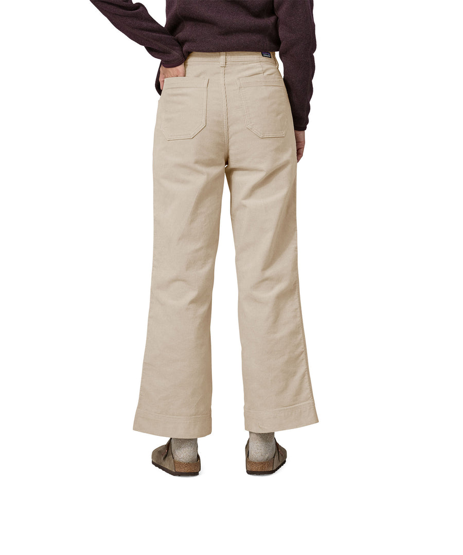 A close up of a woman wearing the Patagonia Women's Wide Leg Cord Pants in a pumice colour showing the back