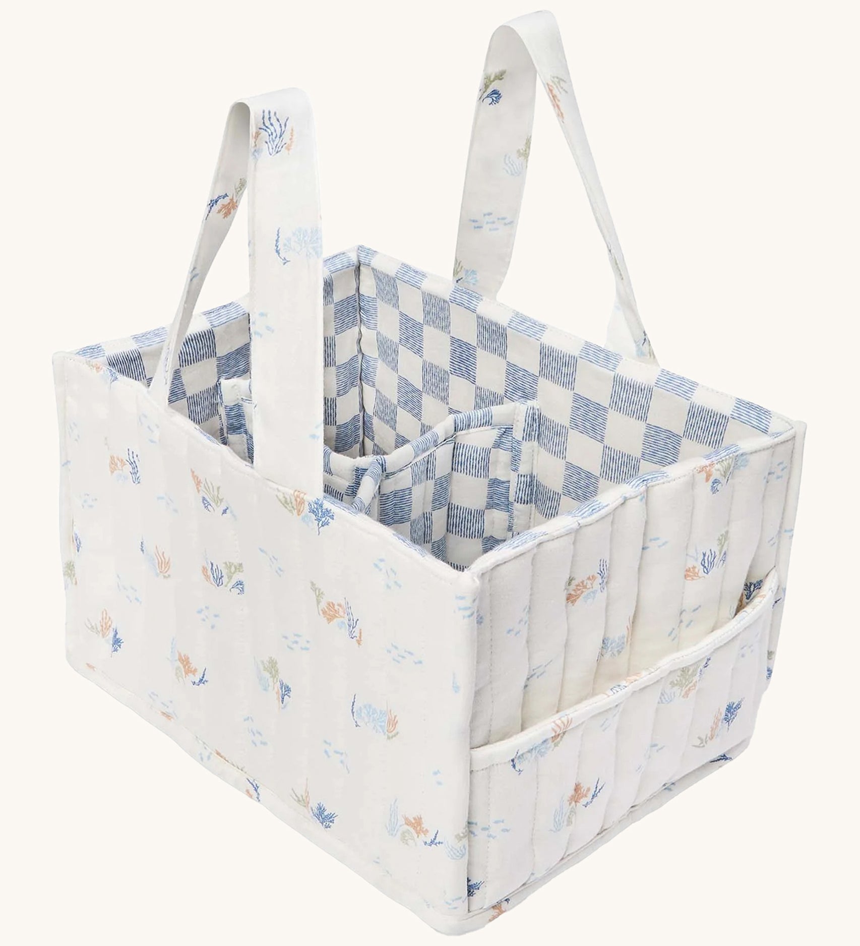 Avery Row Organic Cotton Nappy Caddy Organiser - Coastlines. Made from GOTS Organic Cotton, with a delicate coral print on white fabric, and a checked blue and white lining inside. On a cream background