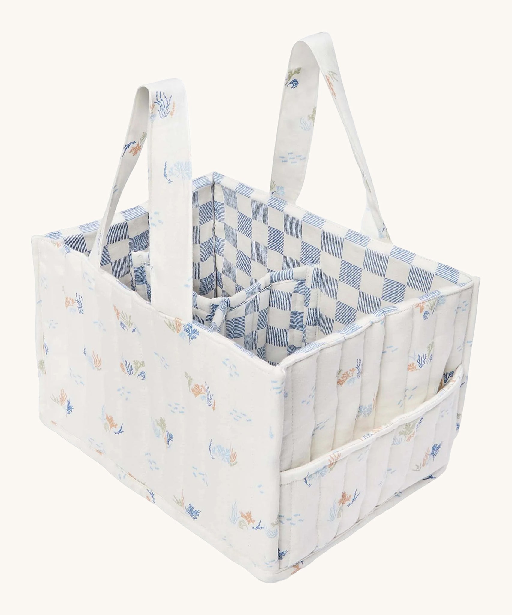 Avery Row Organic Cotton Nappy Caddy Organiser - Coastlines. Made from GOTS Organic Cotton, with a delicate coral print on white fabric, and a checked blue and white lining inside. On a cream background