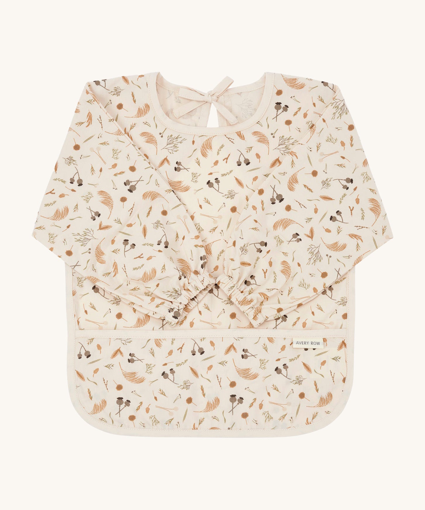 A light cream Avery Row long sleeve  baby bib with a grassland design on a cream background.