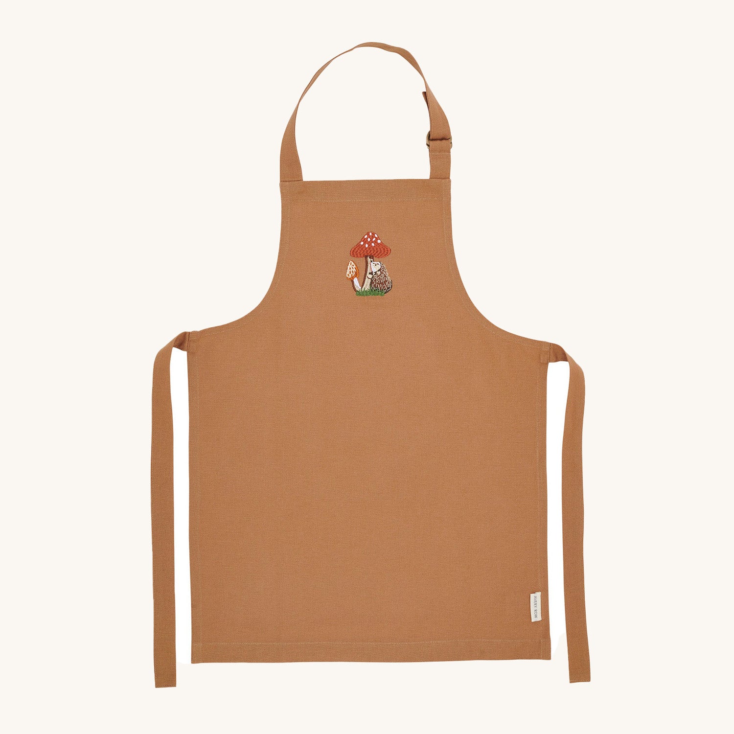 Avery Row Kid's Apron - Woodland Hedgehog. A beautiful light brown cotton canvas apron with a detailed