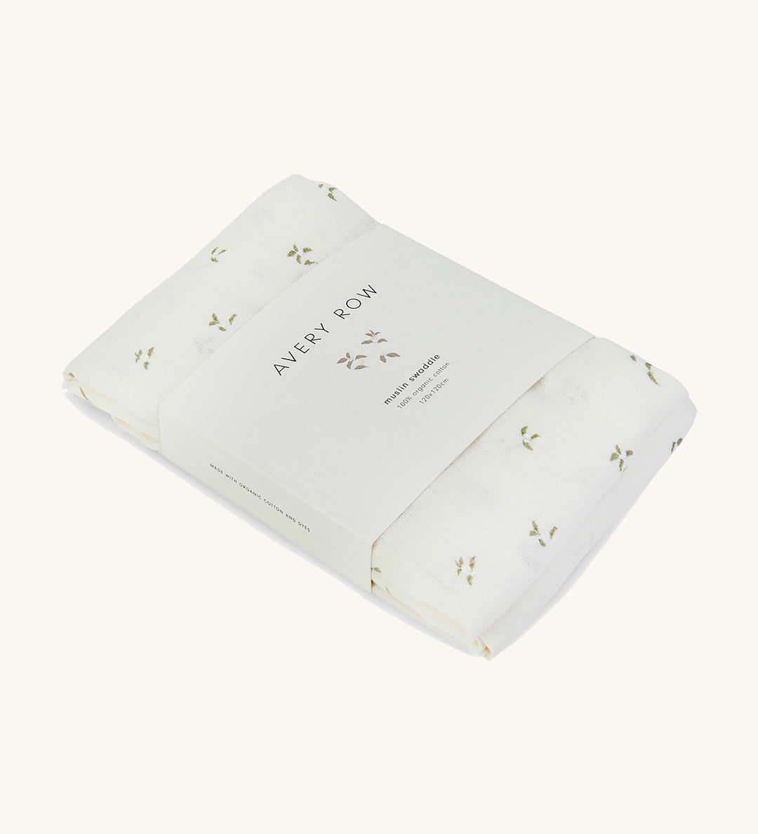 A soft light coloured Avery Row muslin square with a nettle design on a cream background.