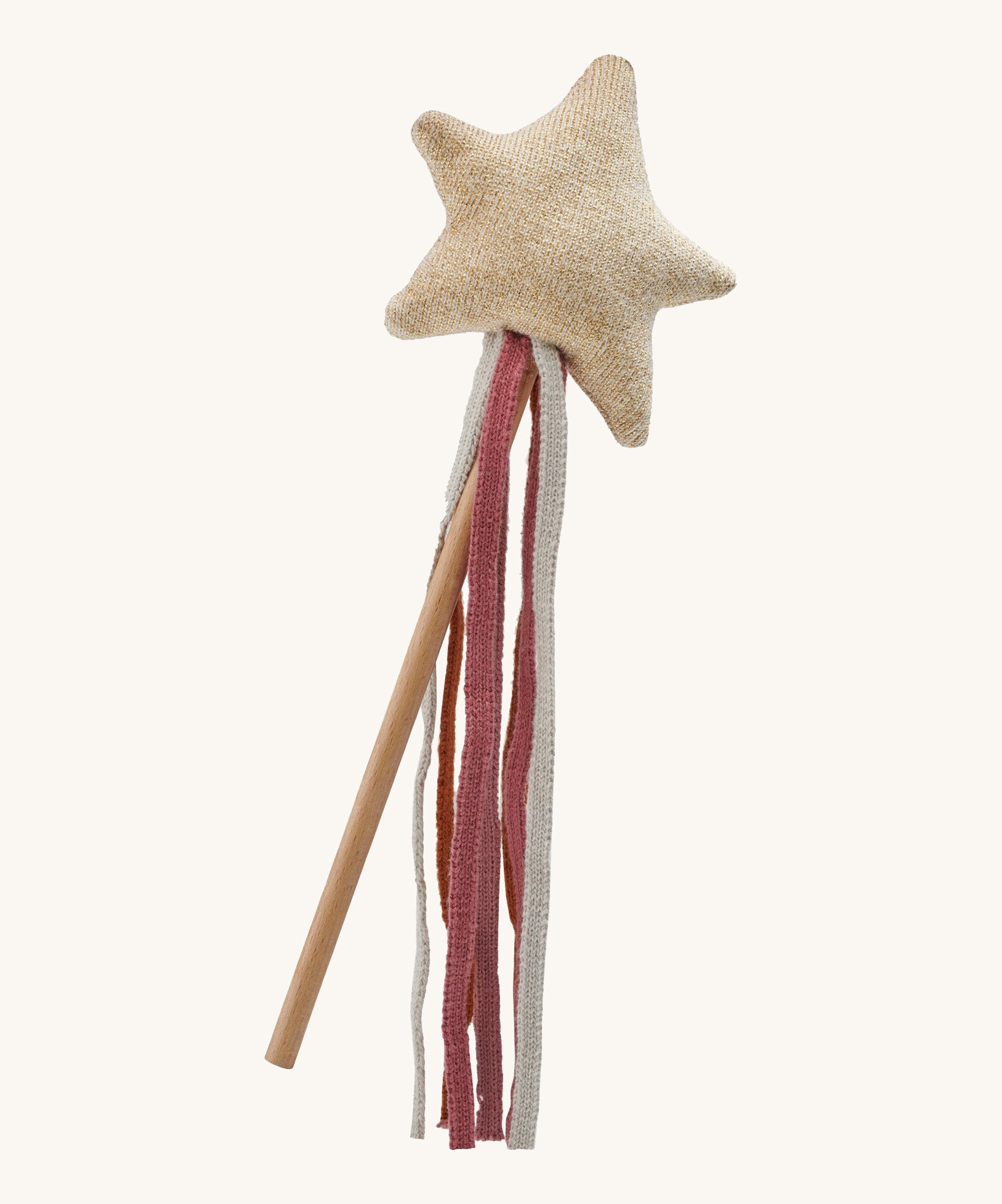 A soft beige Avery row star on a wooden stick and soft fabric strands on a cream background.