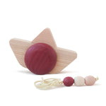 Babai eco-friendly wooden pull and go ship toy on a white background